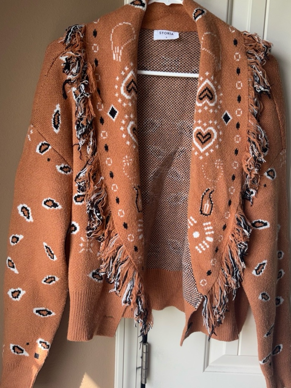 Storia Burnt Orange Fringe Open-Front Cardigan with Heart Motifs